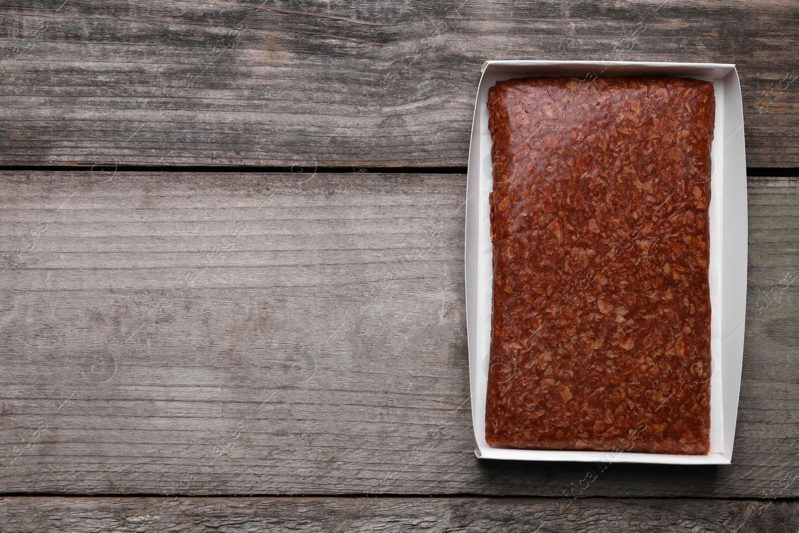 Photo of Fresh raw vegan mince on wooden table, top view. Space for text