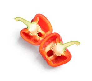 Photo of Halves of ripe red bell pepper on white background, top view