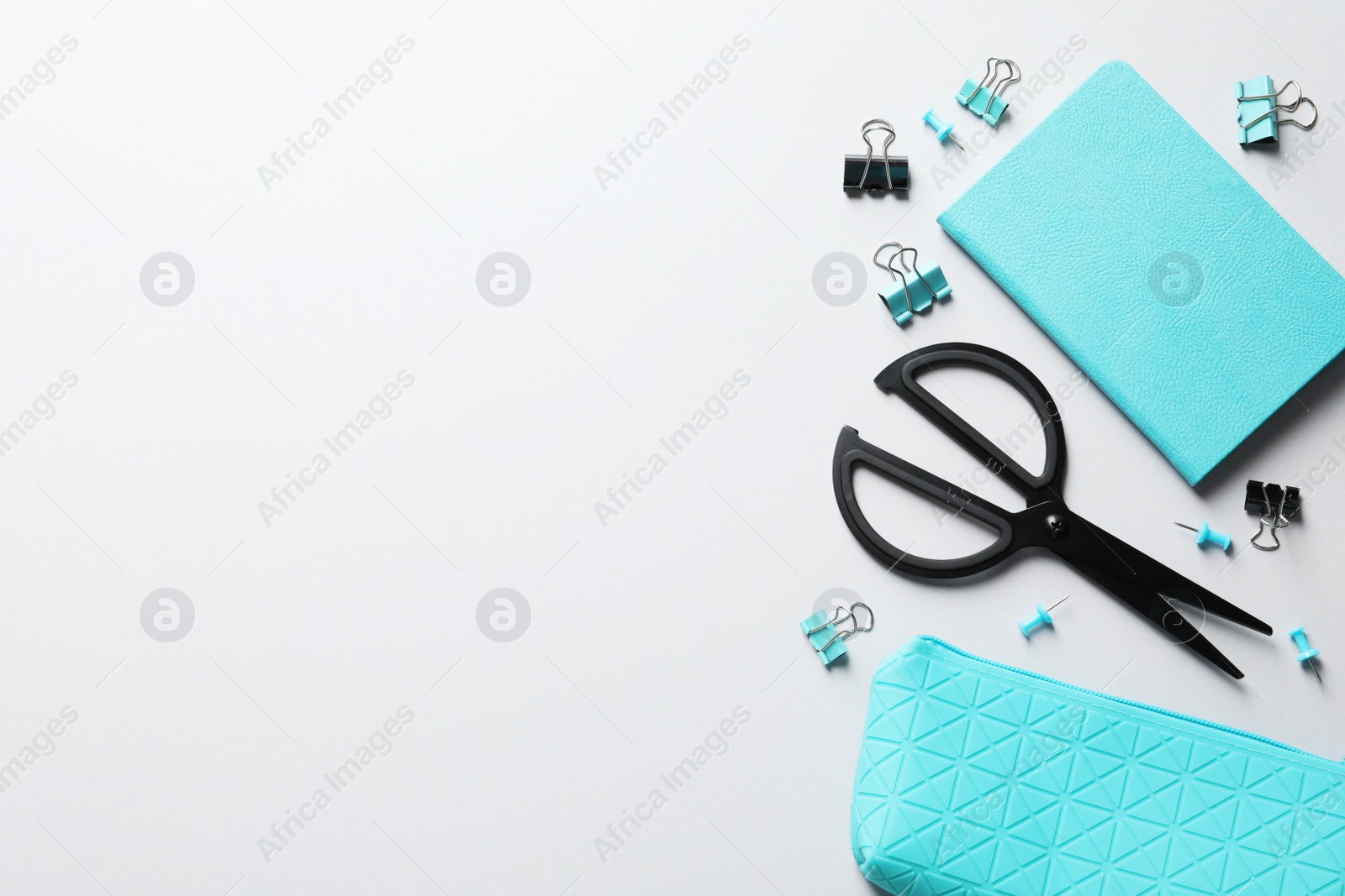 Photo of Flat lay composition with scissors on grey background. Space for text