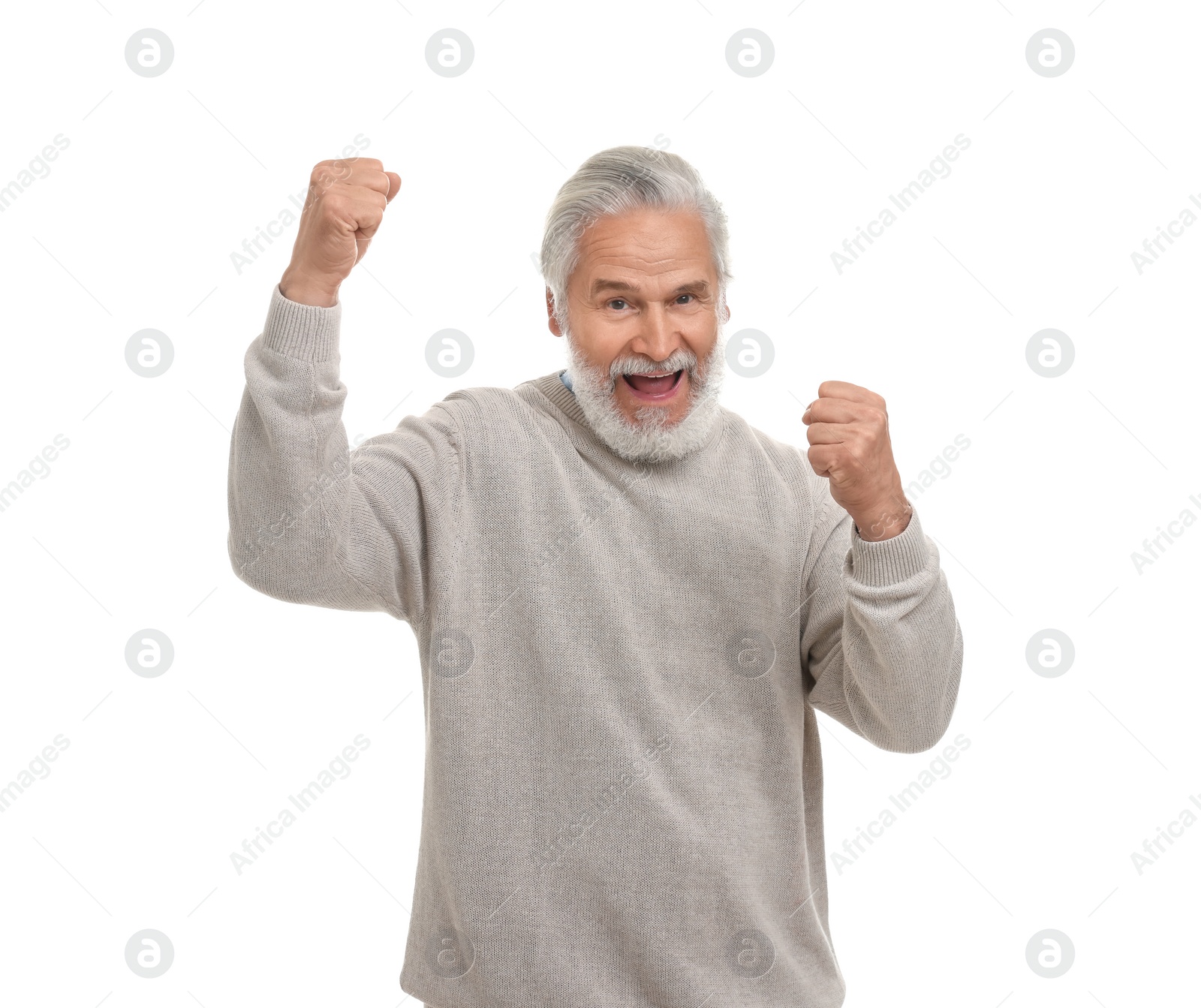 Photo of Emotional senior sports fan celebrating isolated on white