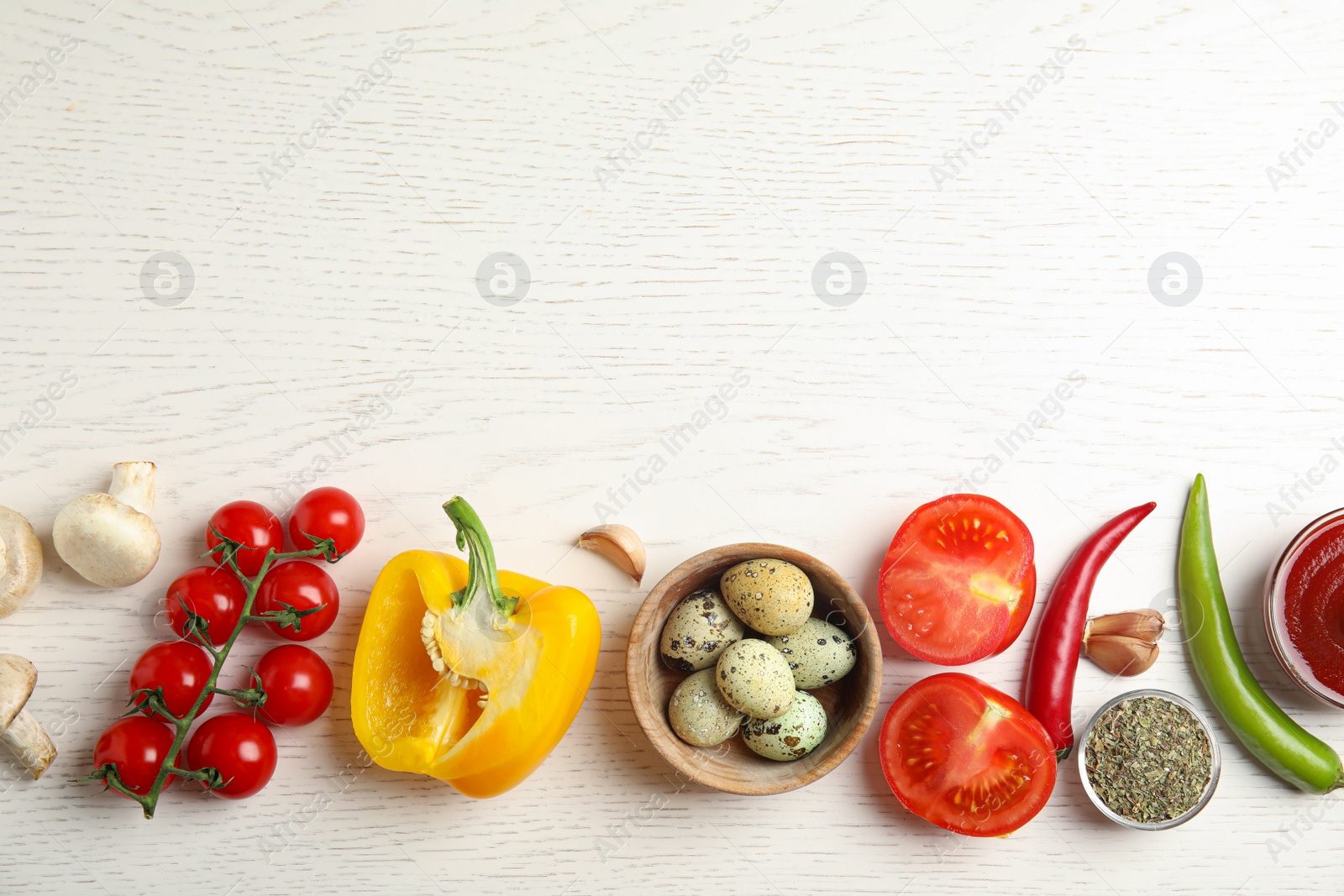 Photo of Flat lay composition with ingredients for cooking on white wooden table. Space for text