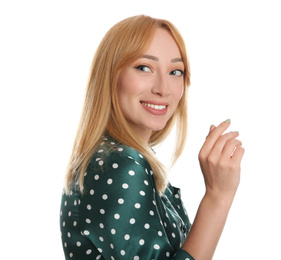 Portrait of beautiful young woman with blonde hair on white background