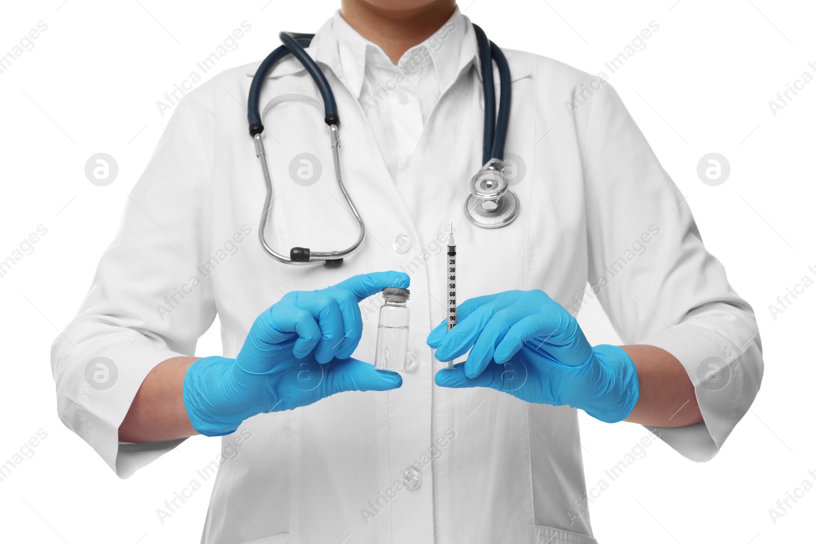 Photo of Doctor holding medical syringe and glass vial on white background, closeup