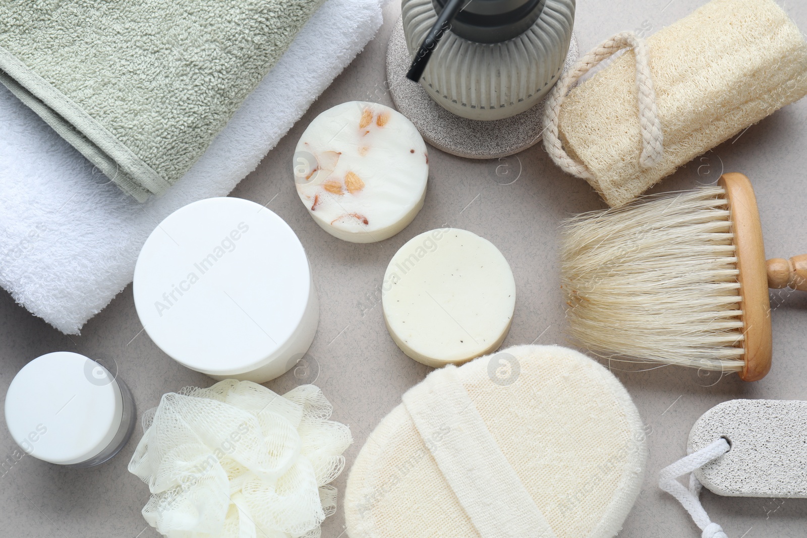 Photo of Bath accessories. Flat lay composition with personal care products on light grey background