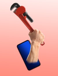 Image of Repair service - just call. Closeup view of man with pipe wrench and smartphone on pink background