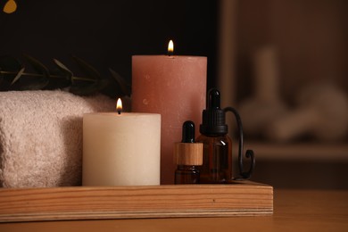 Beautiful composition with different spa products on wooden table indoors