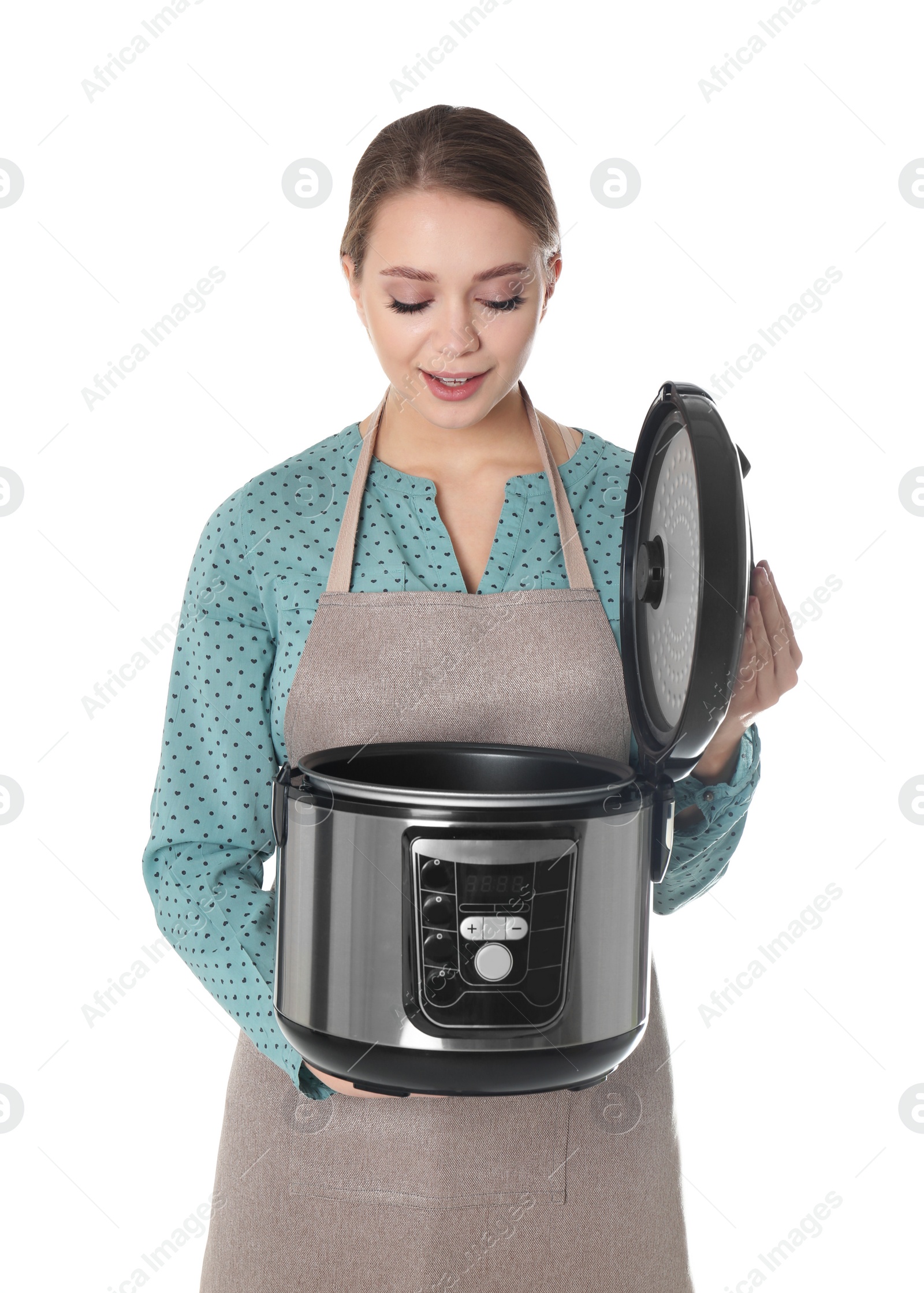 Photo of Portrait of young woman with modern multi cooker on white background