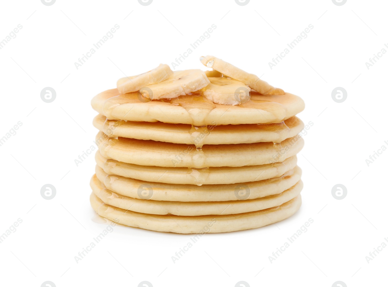 Photo of Delicious pancakes with banana slices and honey isolated on white