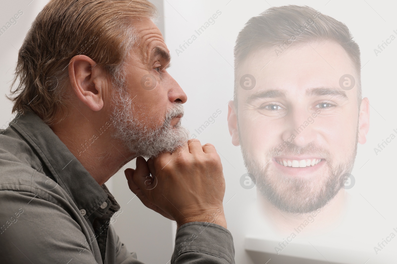 Image of Mature man remembering old times. Translucent picture of young guy showing him in his youth