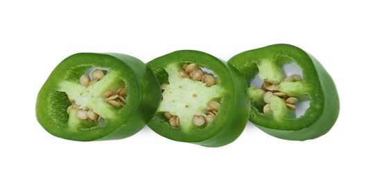 Photo of Cut green hot chili pepper isolated on white, top view