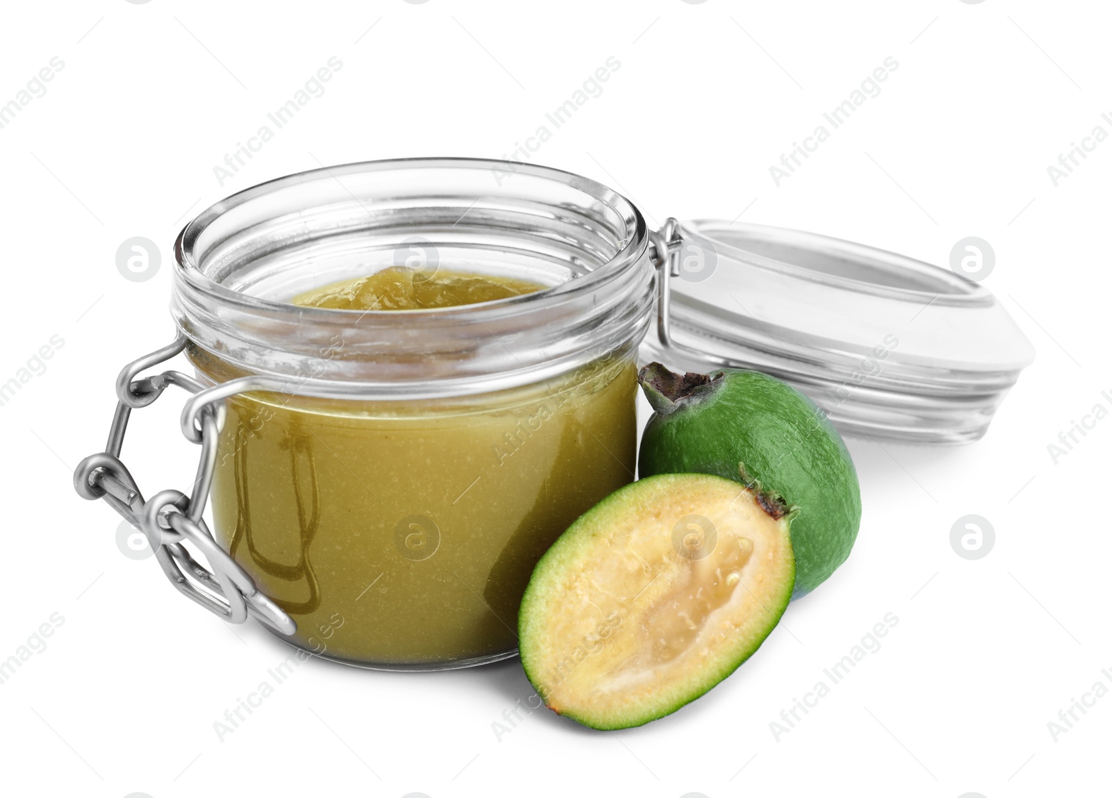 Photo of Feijoa jam in glass jar and fresh fruits on white background