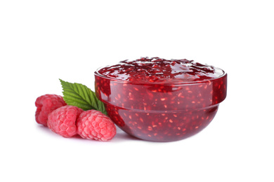 Delicious jam in bowl and fresh raspberries isolated on white