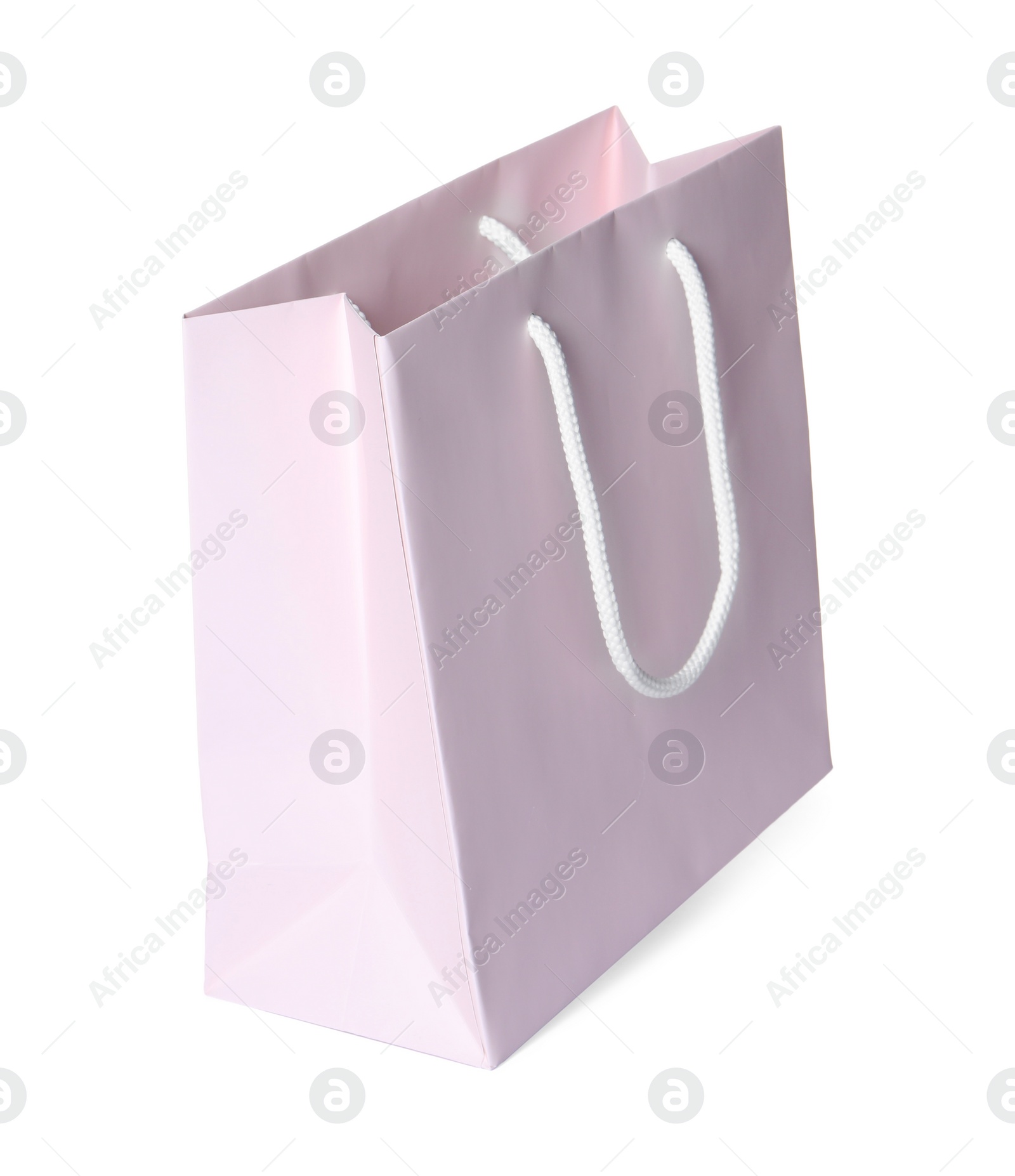 Photo of One paper shopping bag isolated on white