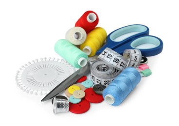 Set of different sewing accessories on white background