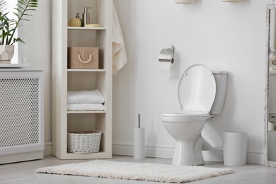 Photo of Toilet bowl in modern bathroom interior