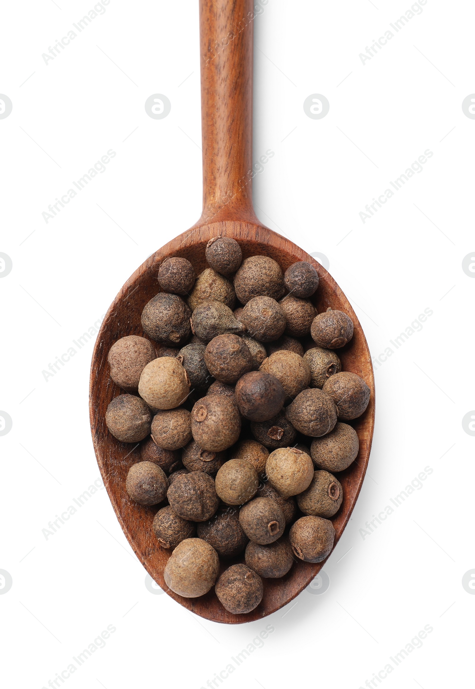 Photo of Dry allspice berries (Jamaica pepper) in spoon isolated on white, top view