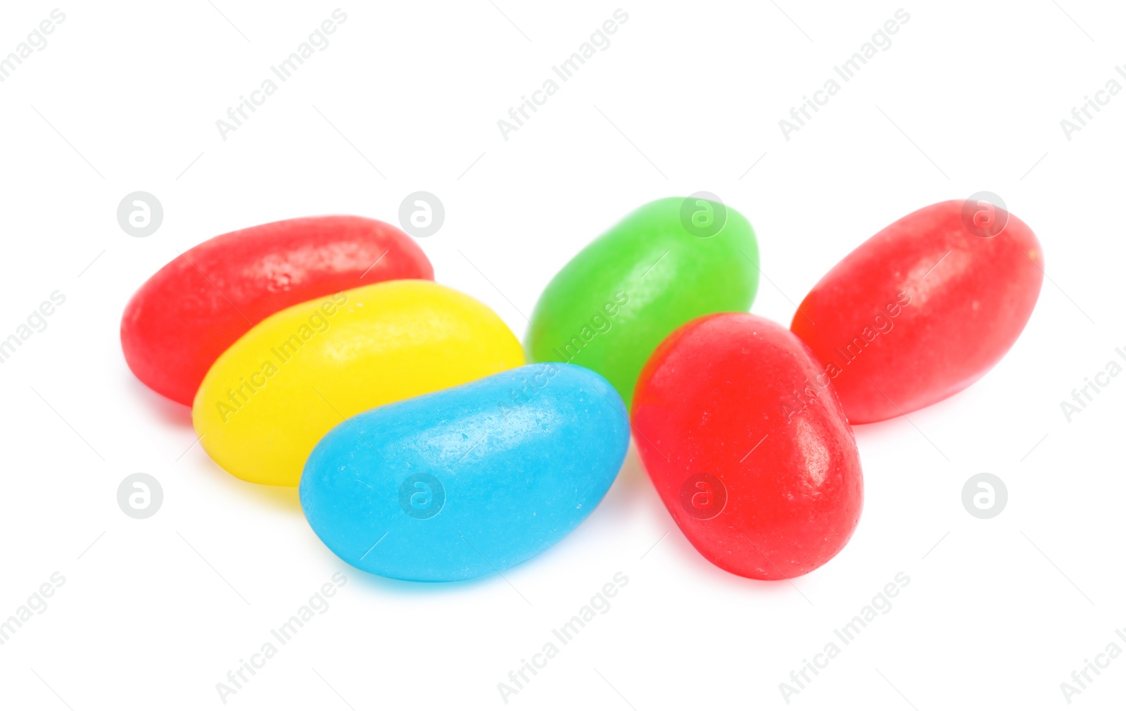 Photo of Delicious colorful jelly beans isolated on white