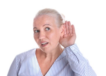 Photo of Mature woman with hearing problem on white background