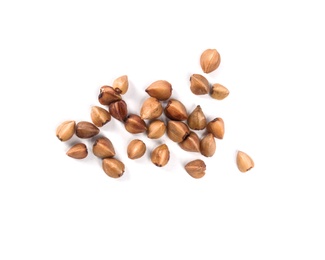 Photo of Uncooked buckwheat on white background, top view