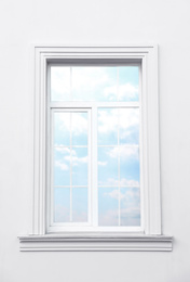 Photo of White wall of modern building with window