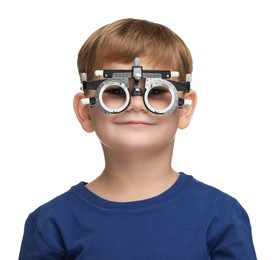 Photo of Vision testing. Little boy with trial frame on white background