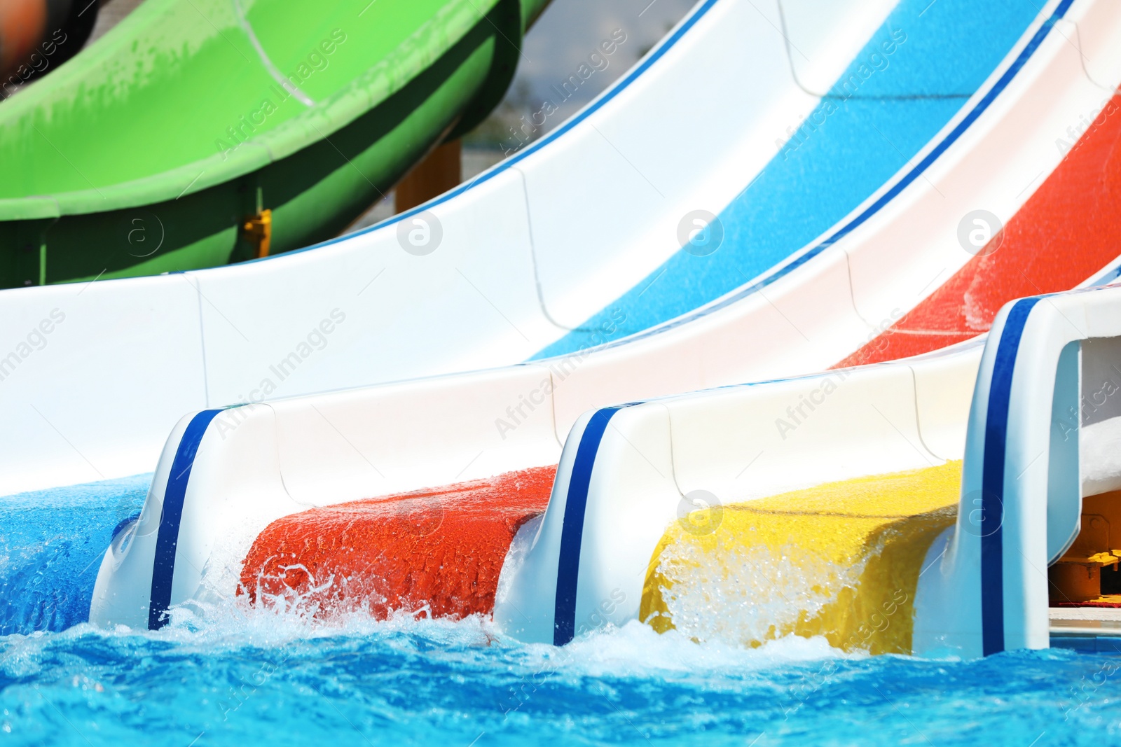 Photo of Water park with colorful slides. Summer vacation