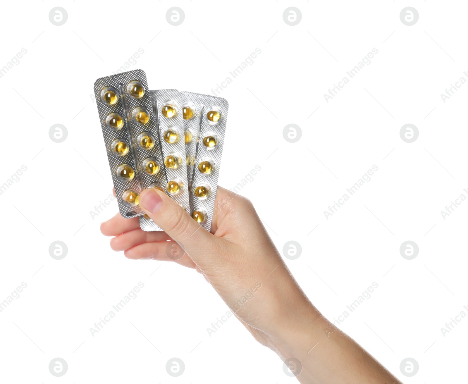 Photo of Woman holding pills in blister packs on white background, closeup