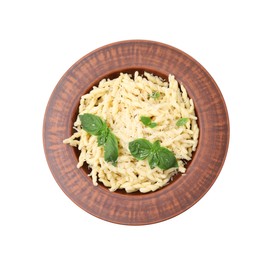 Photo of Plate of delicious trofie pasta with cheese and basil leaves isolated on white, top view