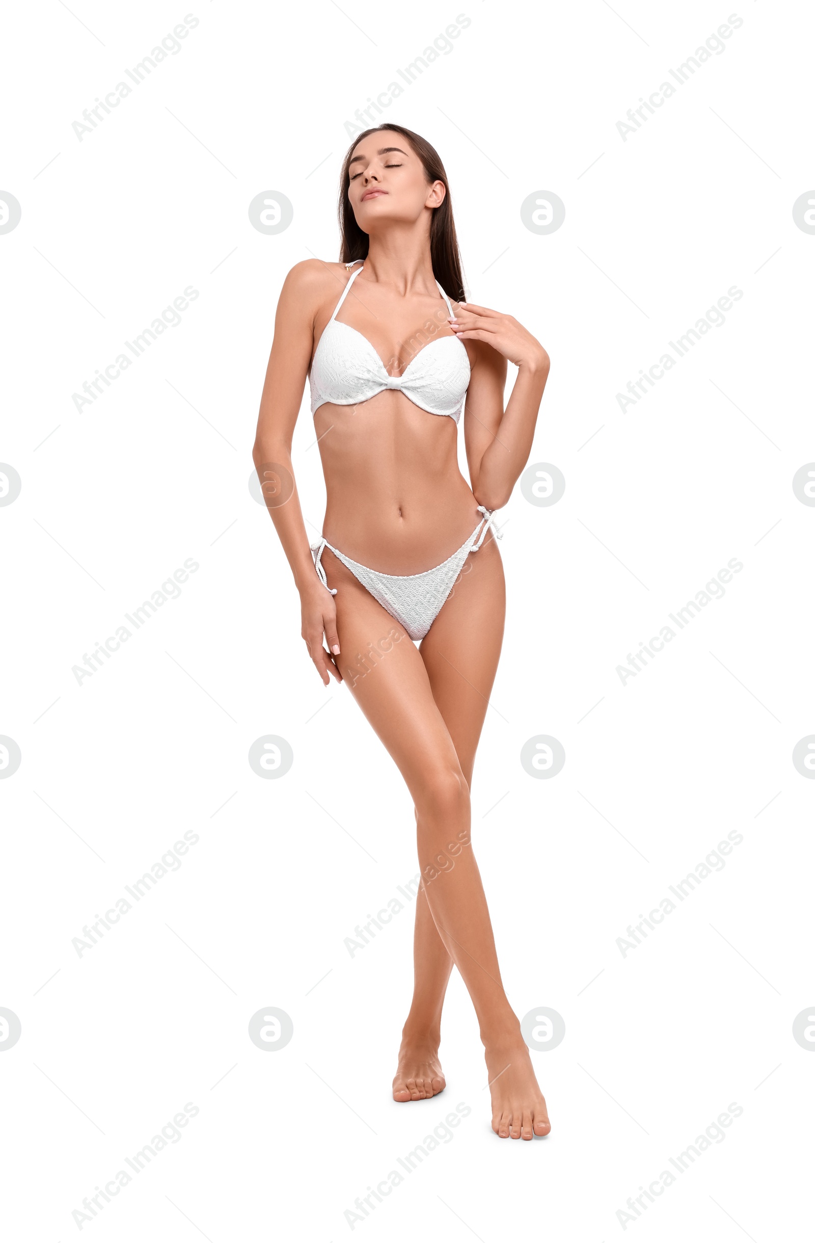 Photo of Young woman in stylish bikini isolated on white