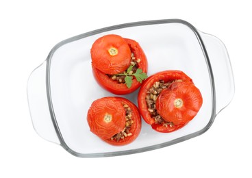 Photo of Baking tray of delicious stuffed tomatoes isolated on white, top view