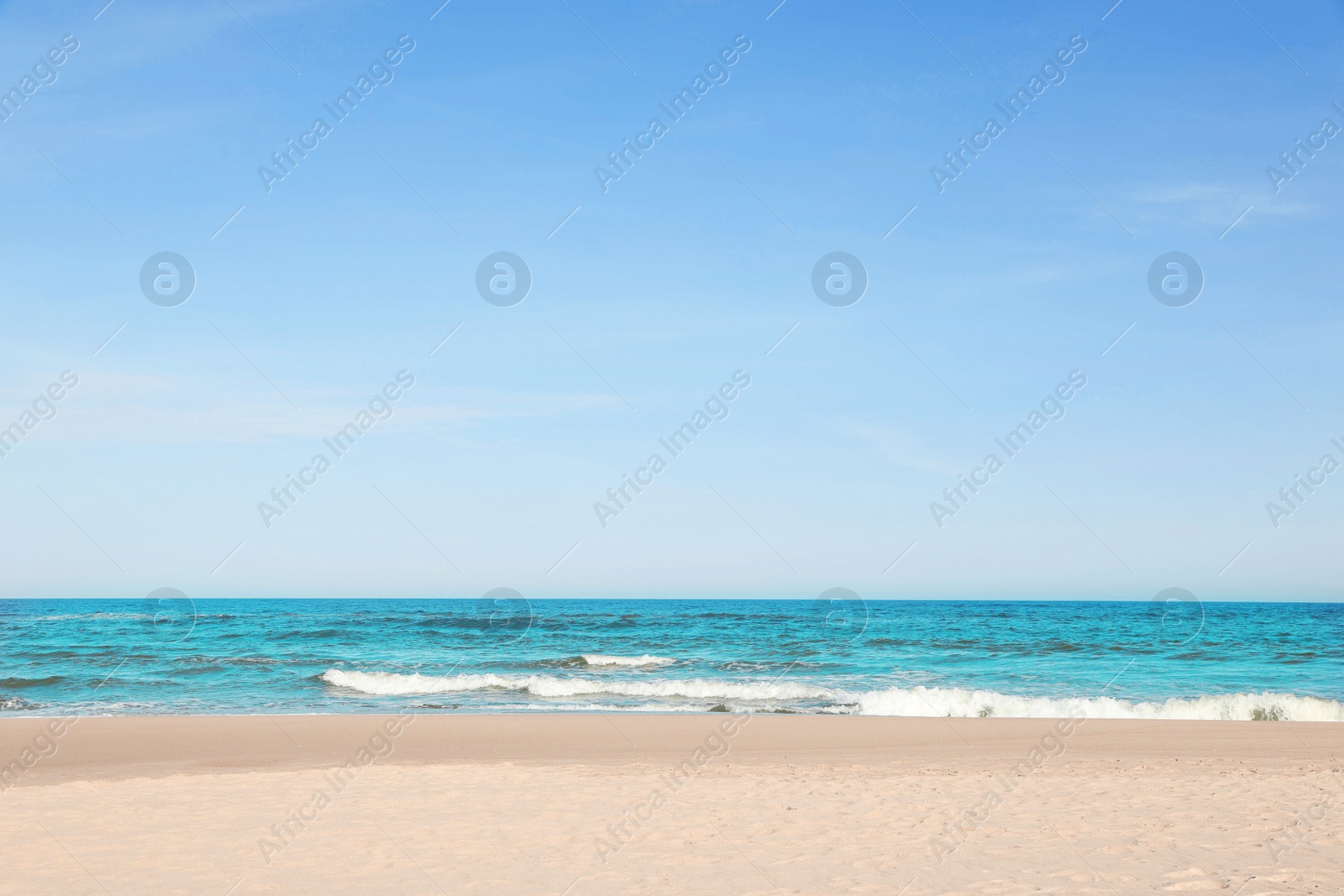 Photo of Picturesque view of beautiful sea and sandy beach on sunny day