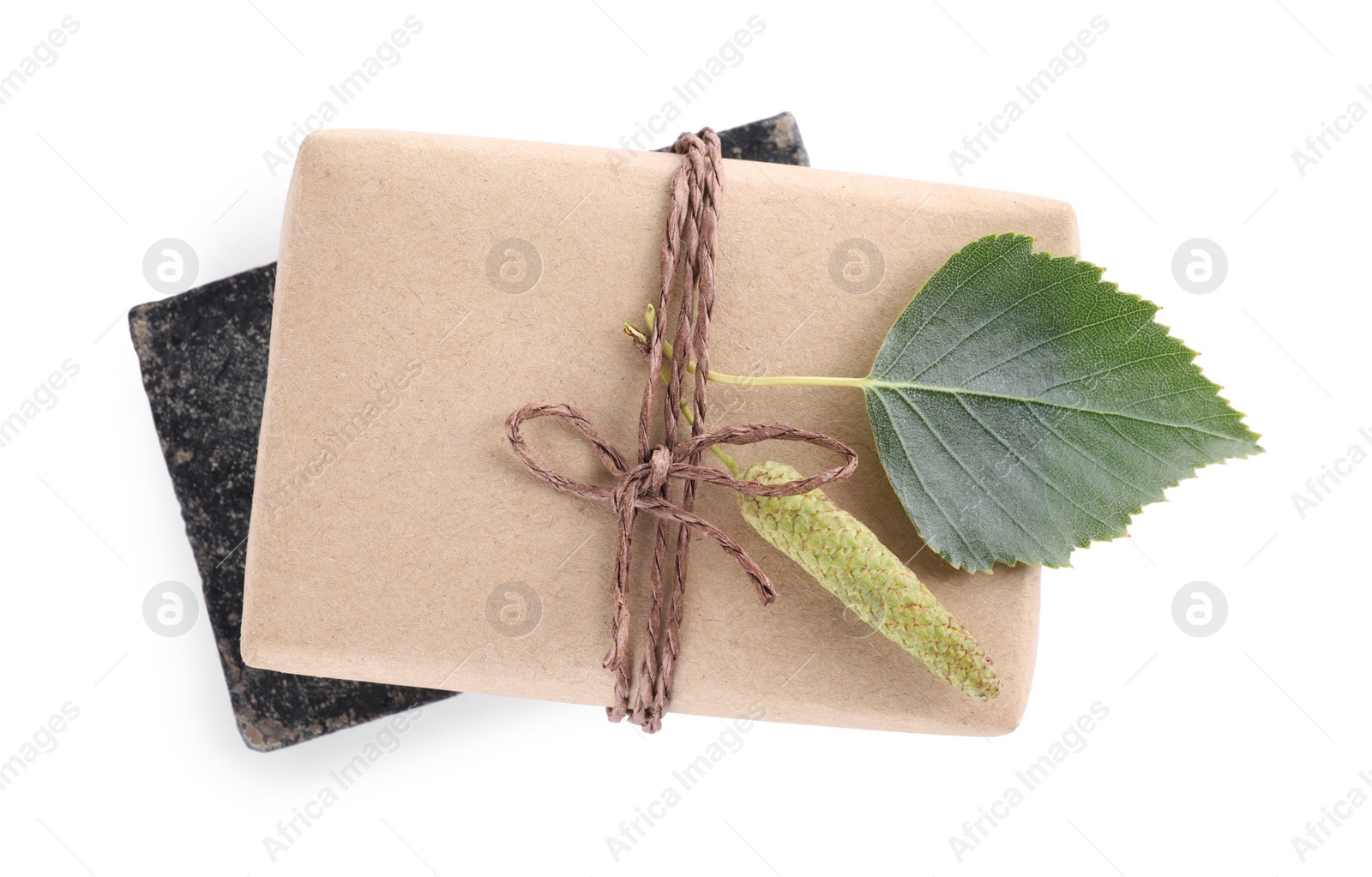 Photo of Natural tar soap isolated on white, top view