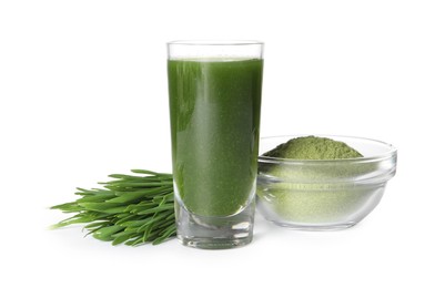 Photo of Wheat grass drink in shot glass, fresh sprouts and bowl of green powder isolated on white