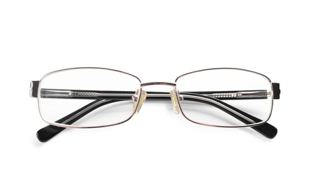 Photo of Glasses with corrective lenses on white background. Vision problem