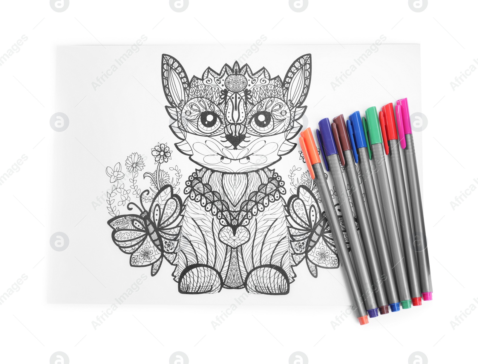 Photo of Antistress coloring page and felt tip pens on white background, top view