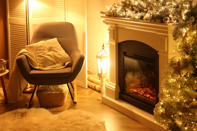 Photo of Fireplace in living room decorated for Christmas
