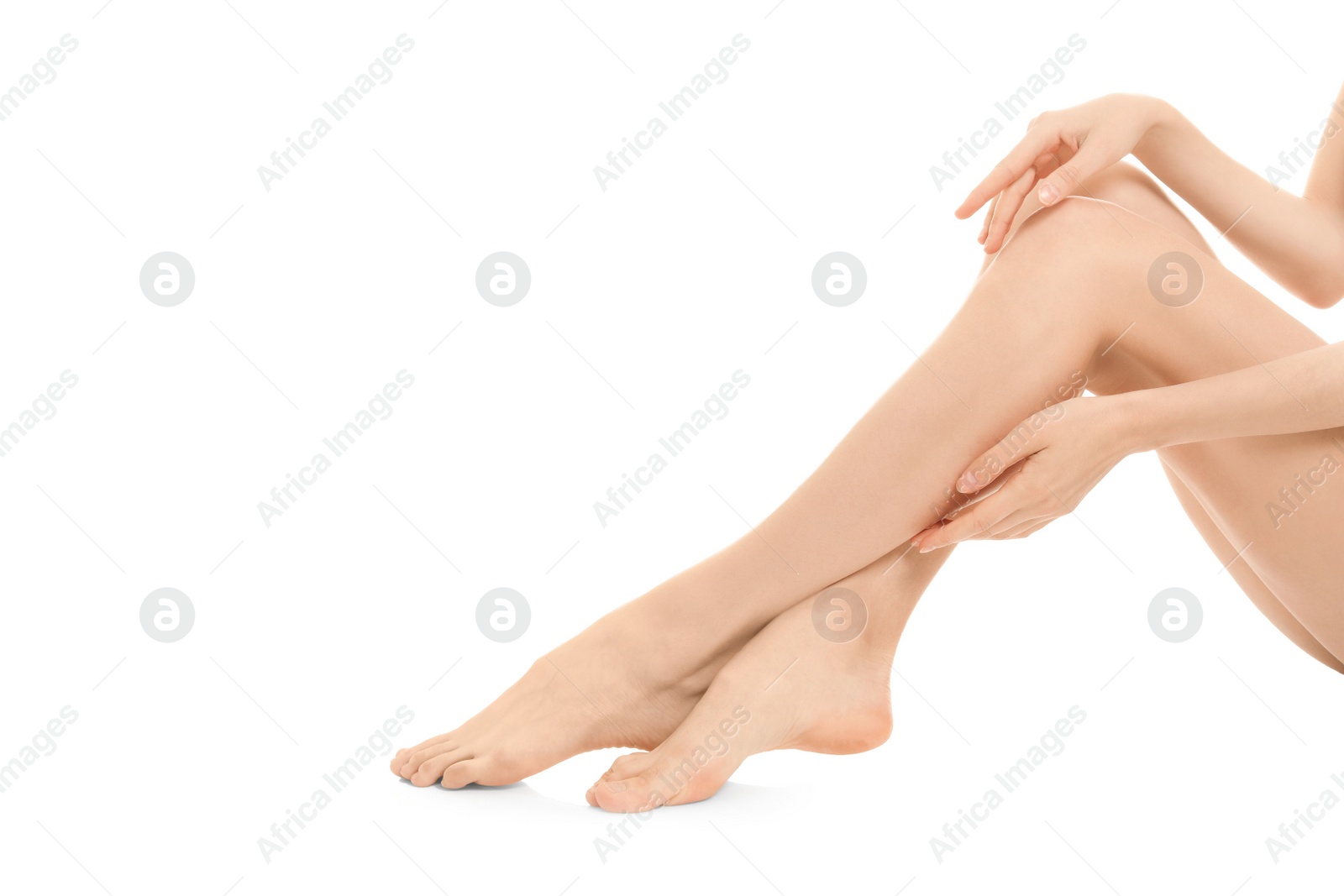 Photo of Young woman showing smooth silky skin after epilation on white background