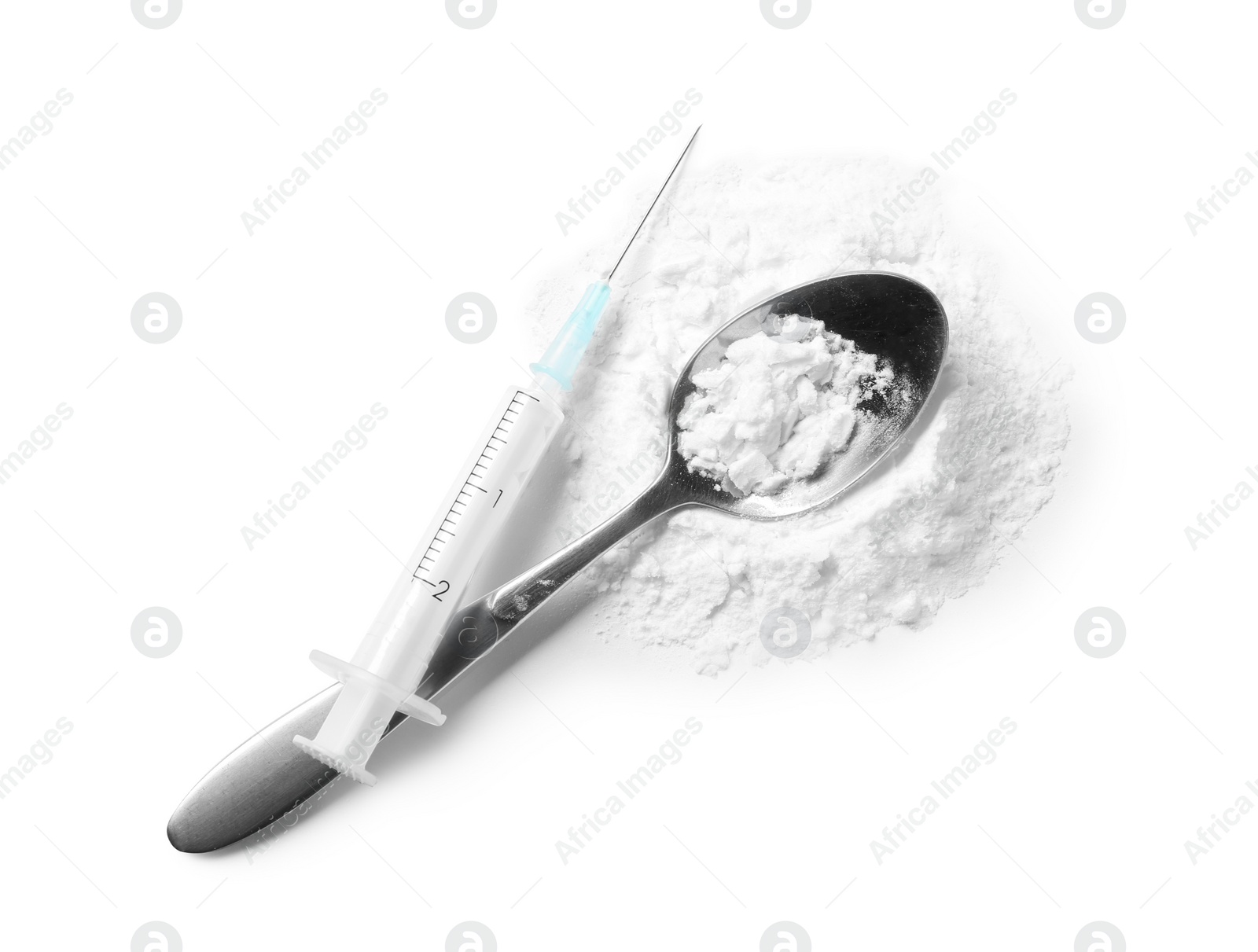 Photo of Spoon with cocaine and empty syringe on white background, top view