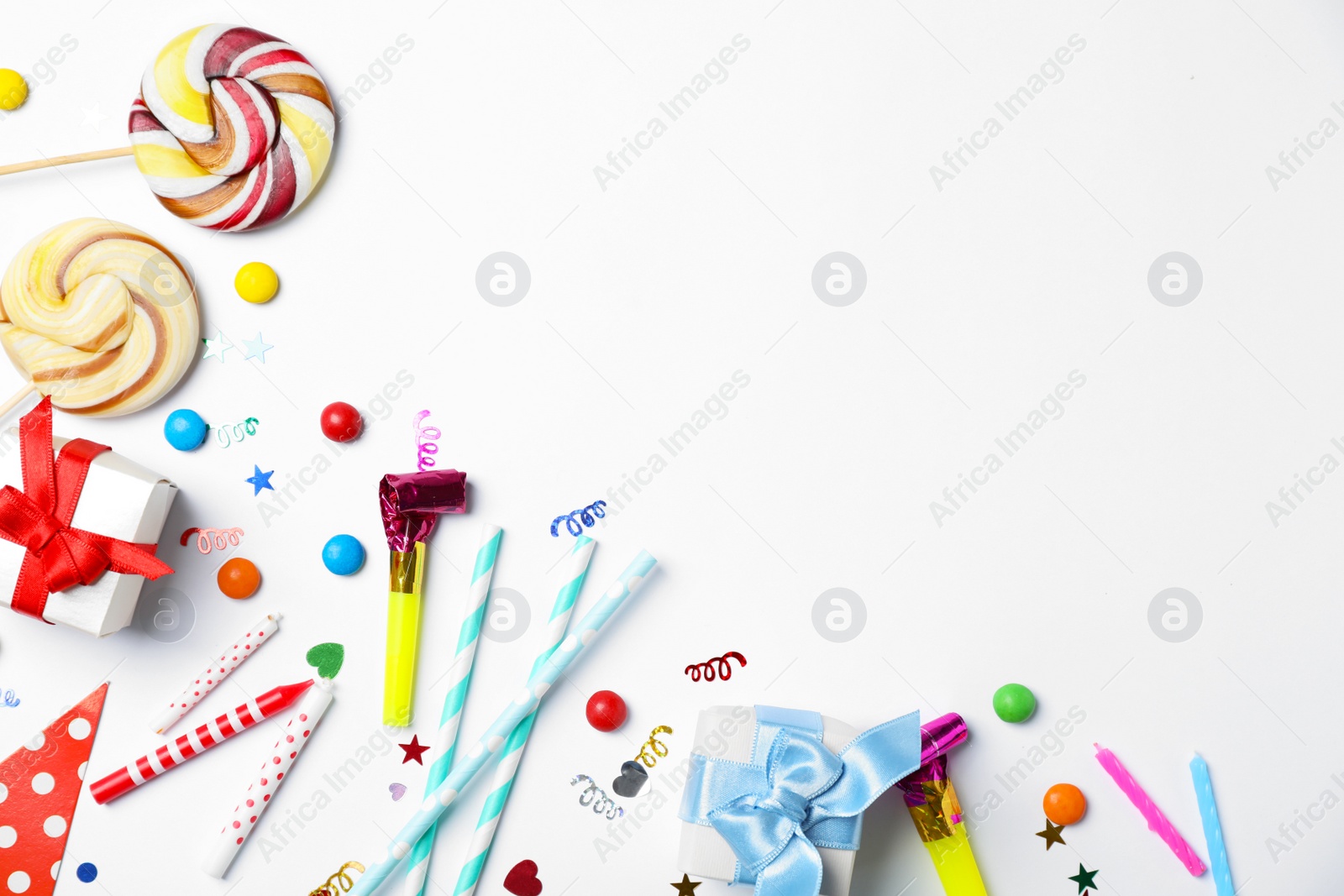 Photo of Flat lay composition with birthday party items on light background