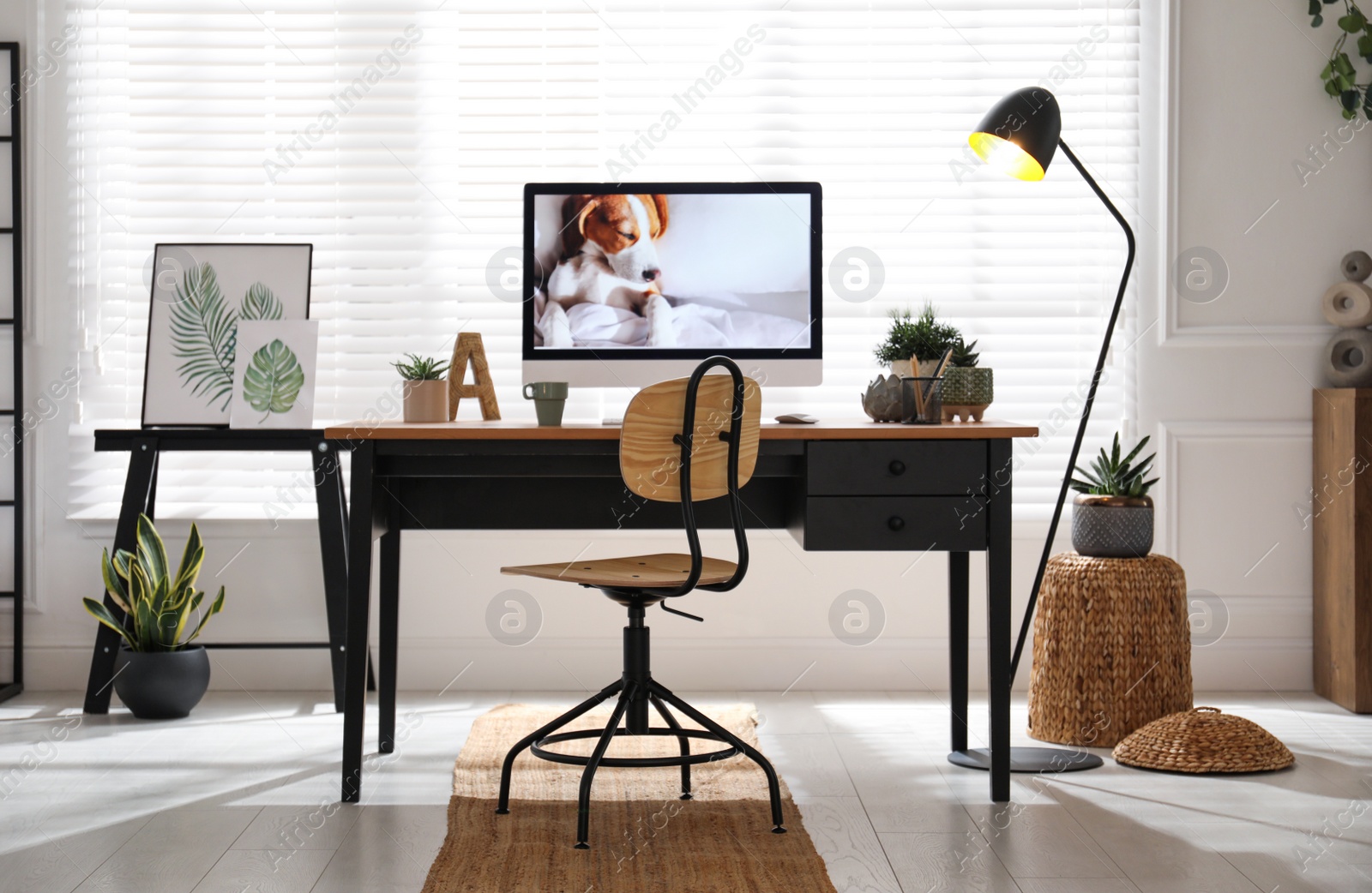 Photo of Stylish home office interior with comfortable workplace