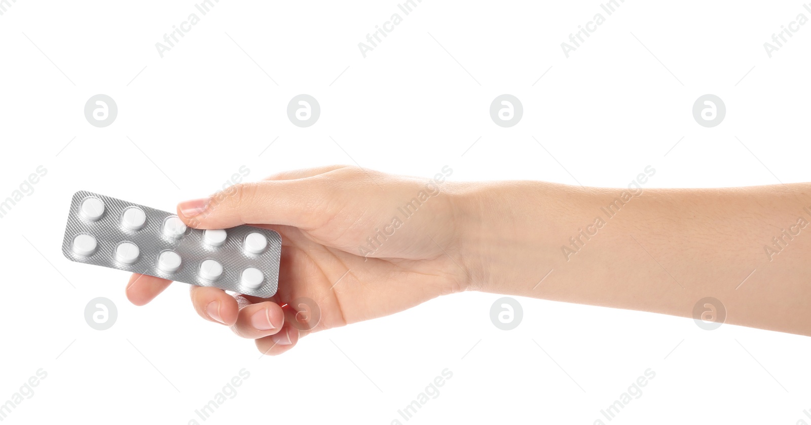 Photo of Woman holding pills in blister pack on white background, closeup