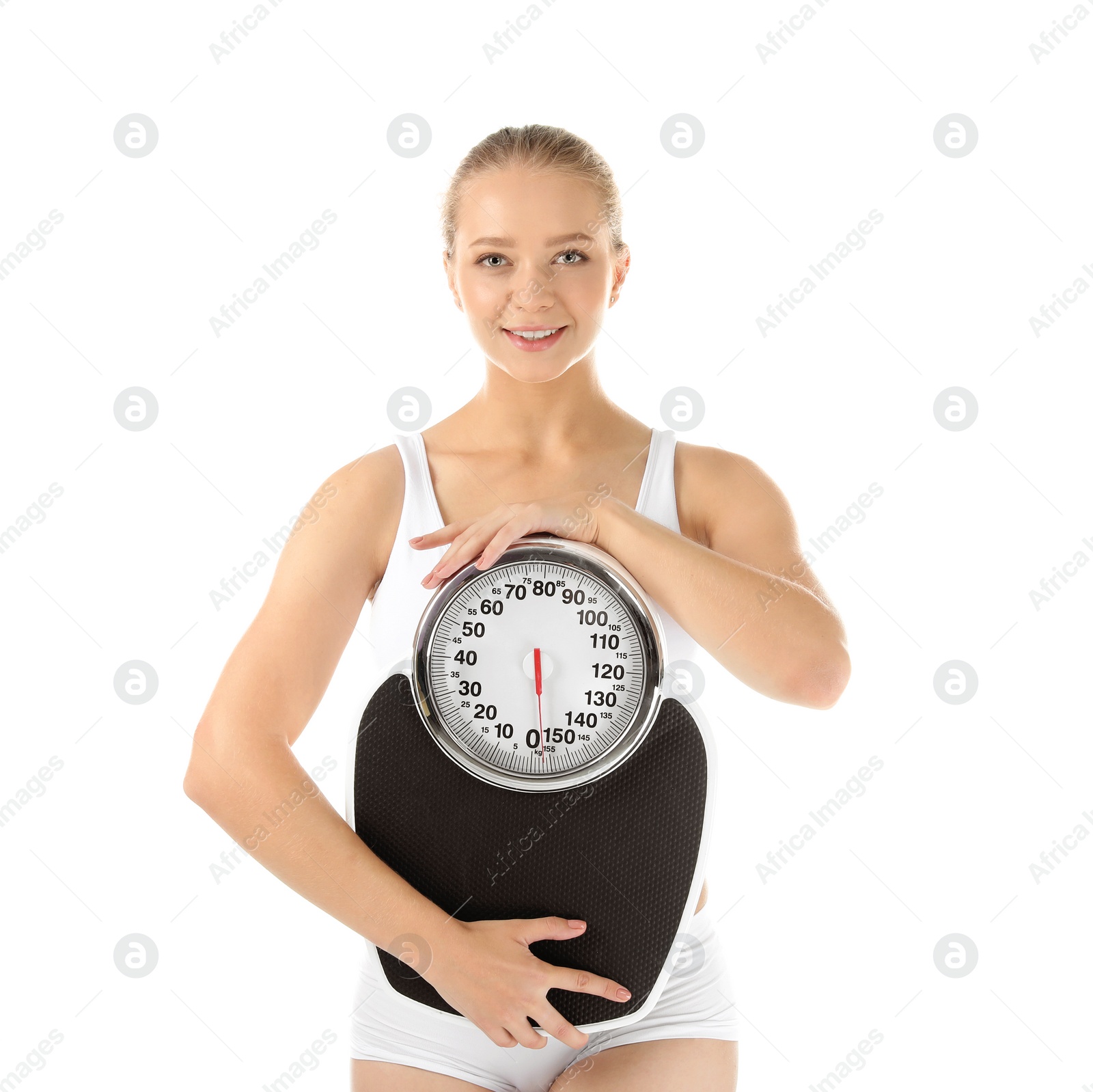 Photo of Beautiful young woman with scales on white background. Healthy diet