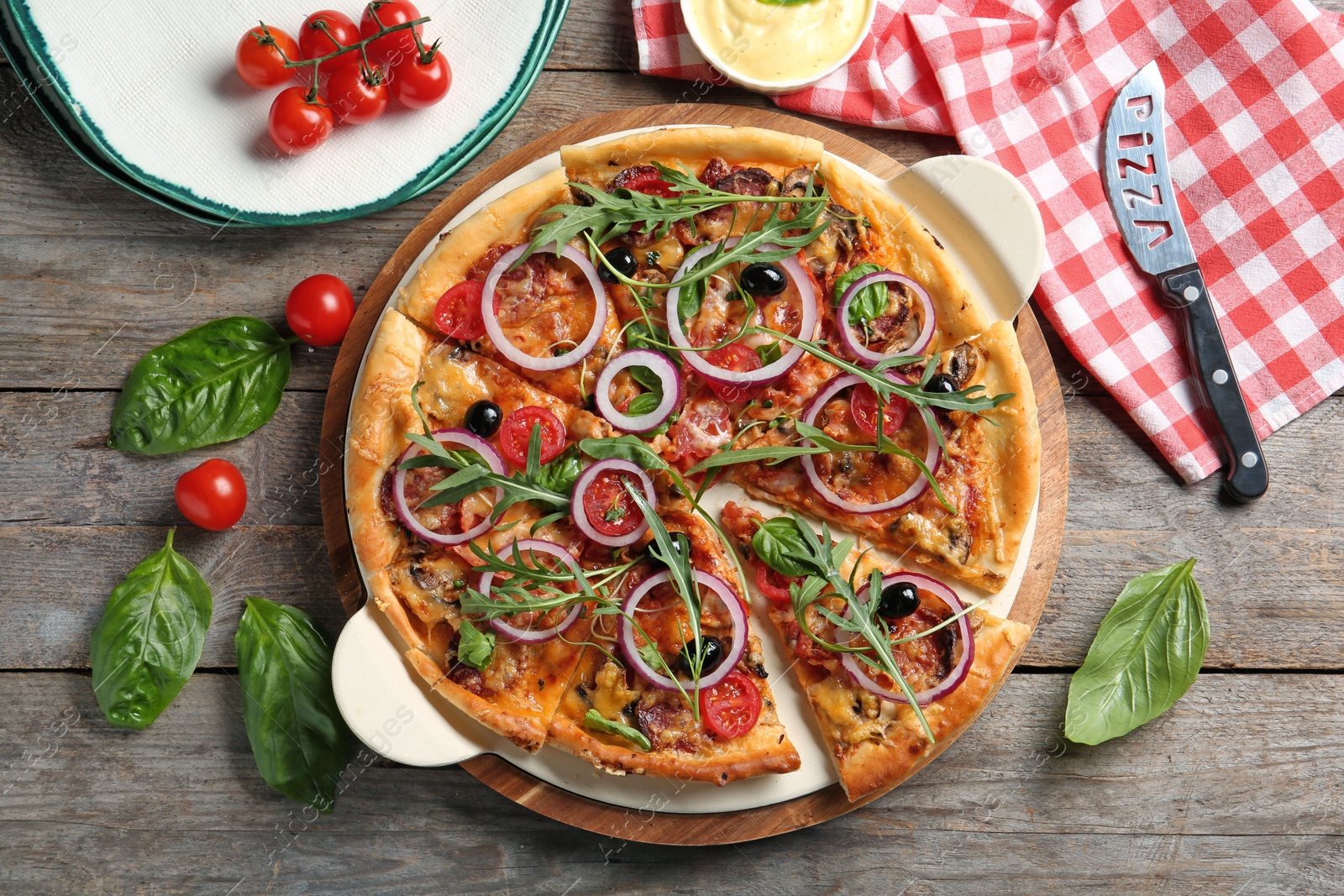 Photo of Flat lay composition with tasty homemade pizza on table