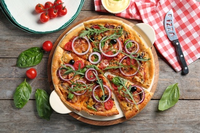 Flat lay composition with tasty homemade pizza on table