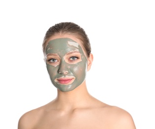 Photo of Beautiful woman with clay mask on her face against white background