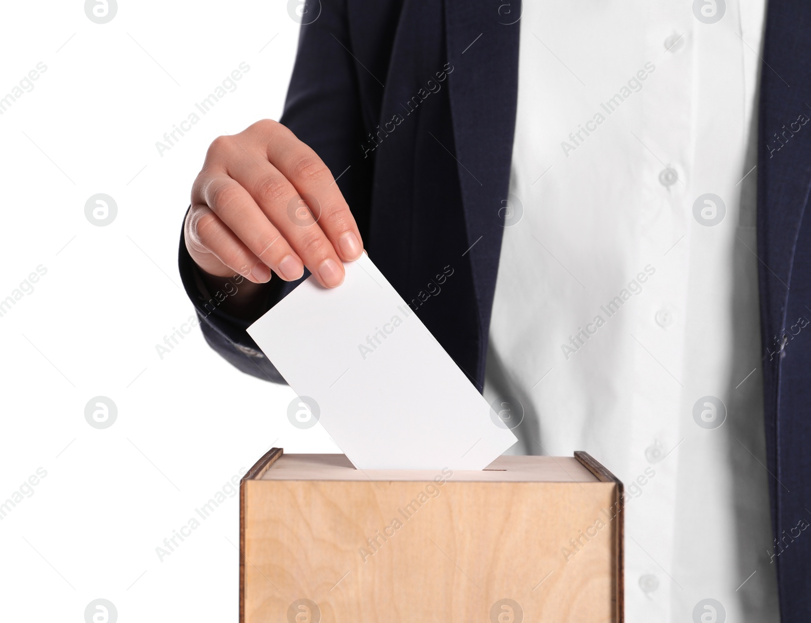 Photo of Woman putting her vote into ballot box on white background, closeup