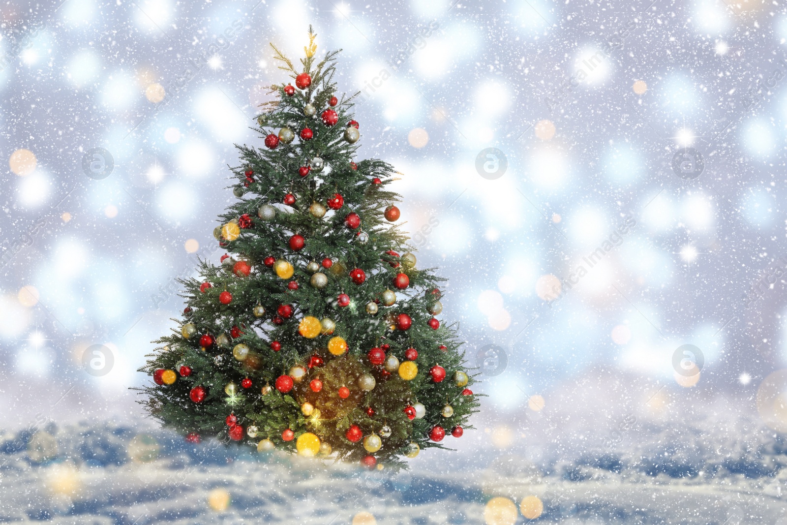 Image of Beautifully decorated Christmas tree on blurred background. Bokeh effect