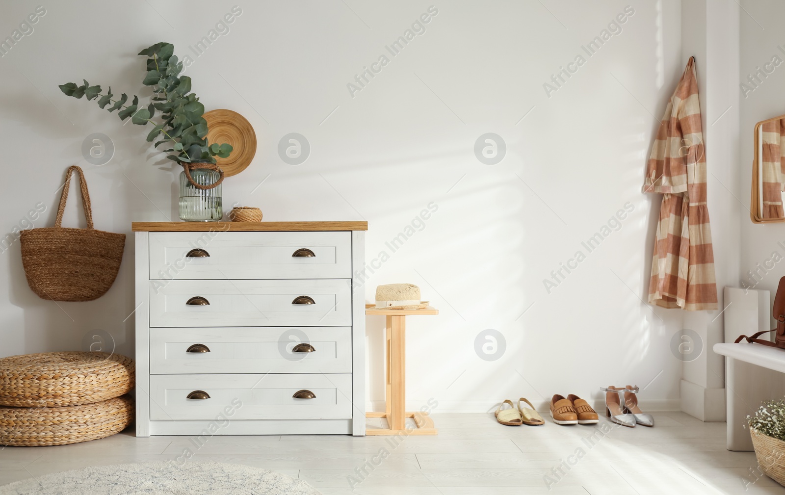 Photo of Chest of drawers in stylish room interior