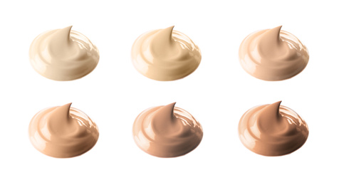 Image of Set of different foundation shades on white background. Banner design