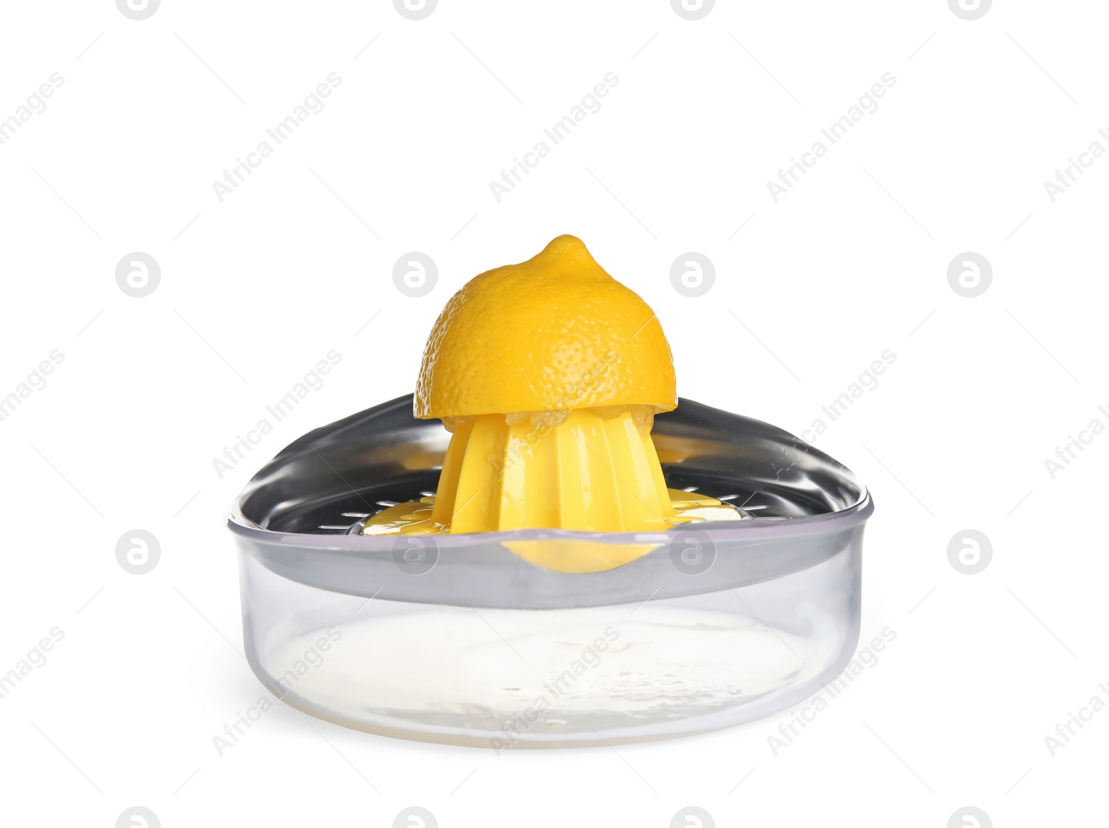 Photo of Metal juicer with half of lemon on white background